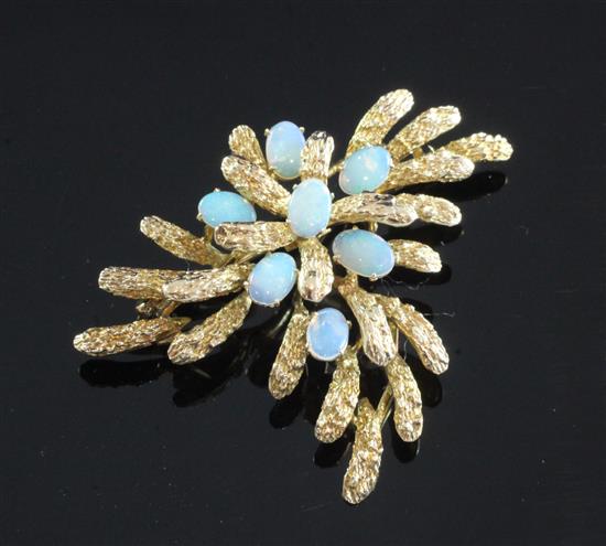 A 14ct gold and white opal spray brooch, width approx. 2in.